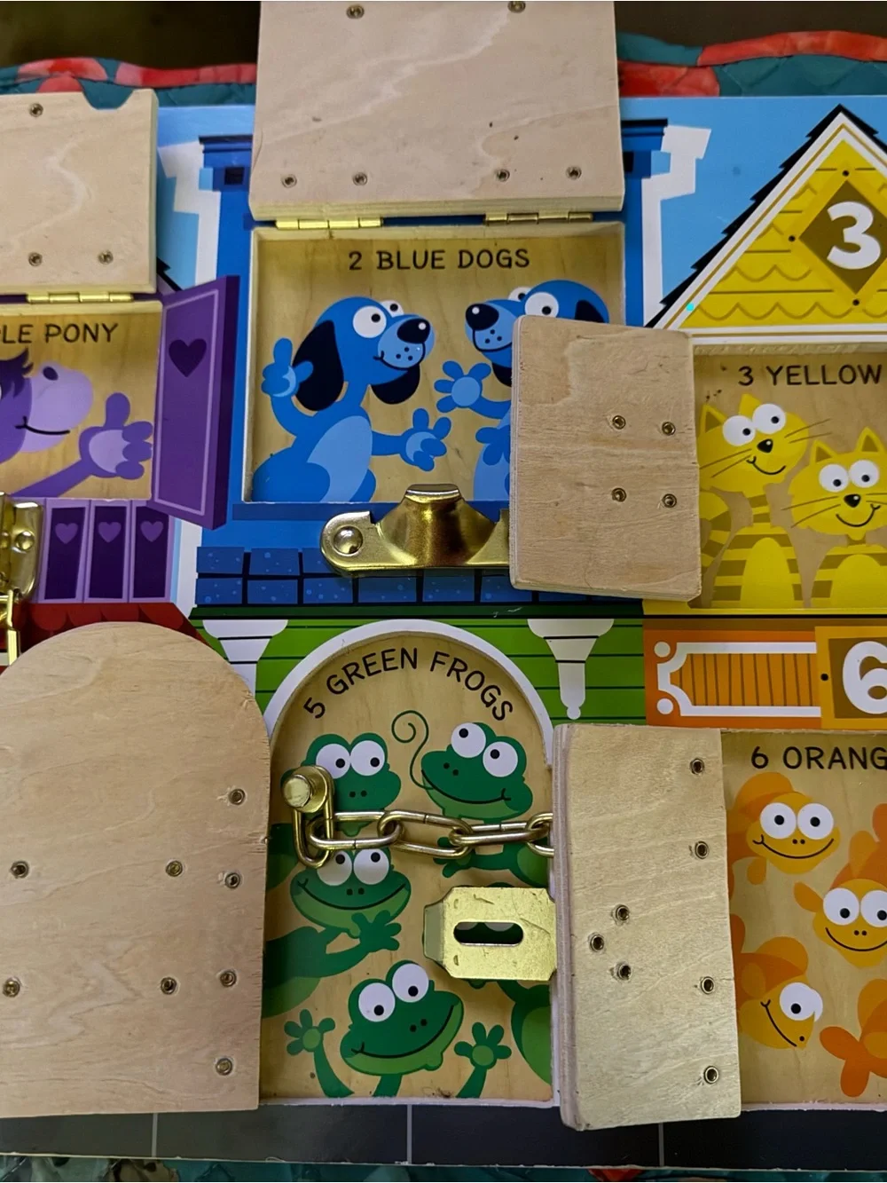 Melissa & Doug latches Kids Busy Board with Locks and Latches!